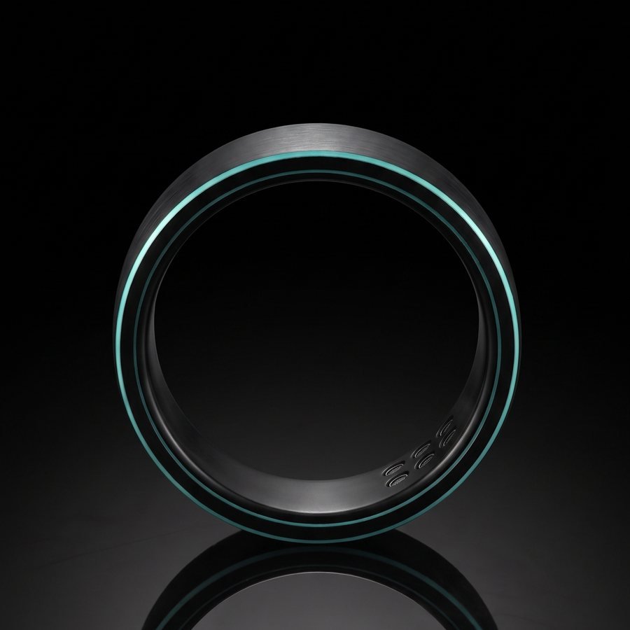 The ring standing on a reflective black surface